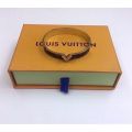 Louis Vuitton Female V Sign Open Monogram / Damier Canvas Covered Metal  Hoop Bracelet Vintage Fashion